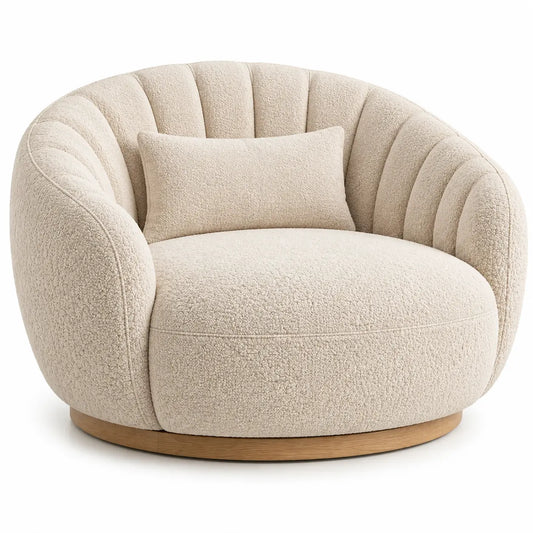 Beige upholstered curved line armchair with channel-tufted cushioning, modern furniture piece by periodpieceshop.